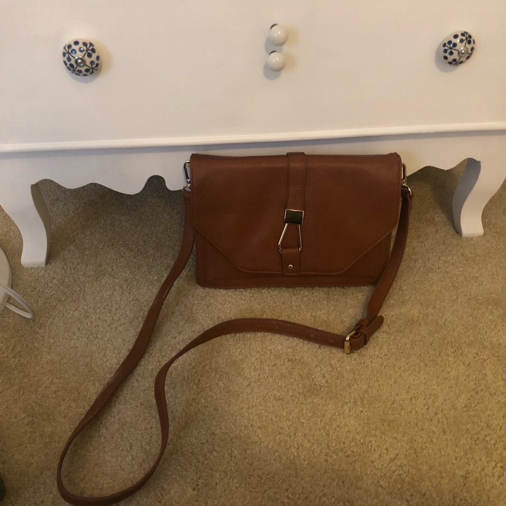 Crossbody brown purse with gold hardware